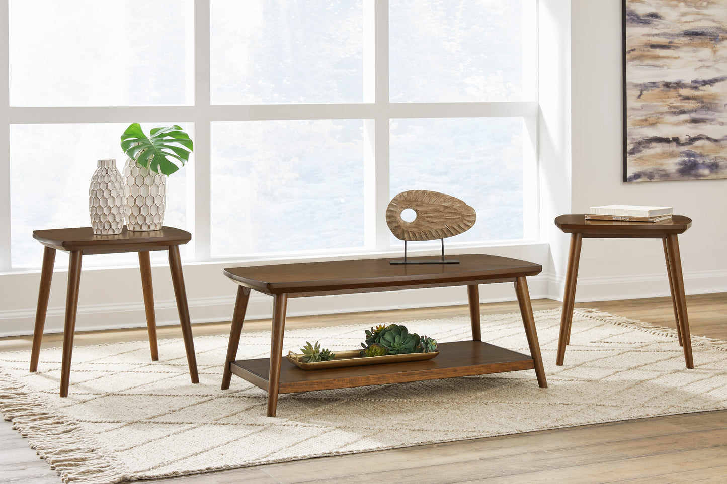 Lynncott Coffee Table and two End Table Set